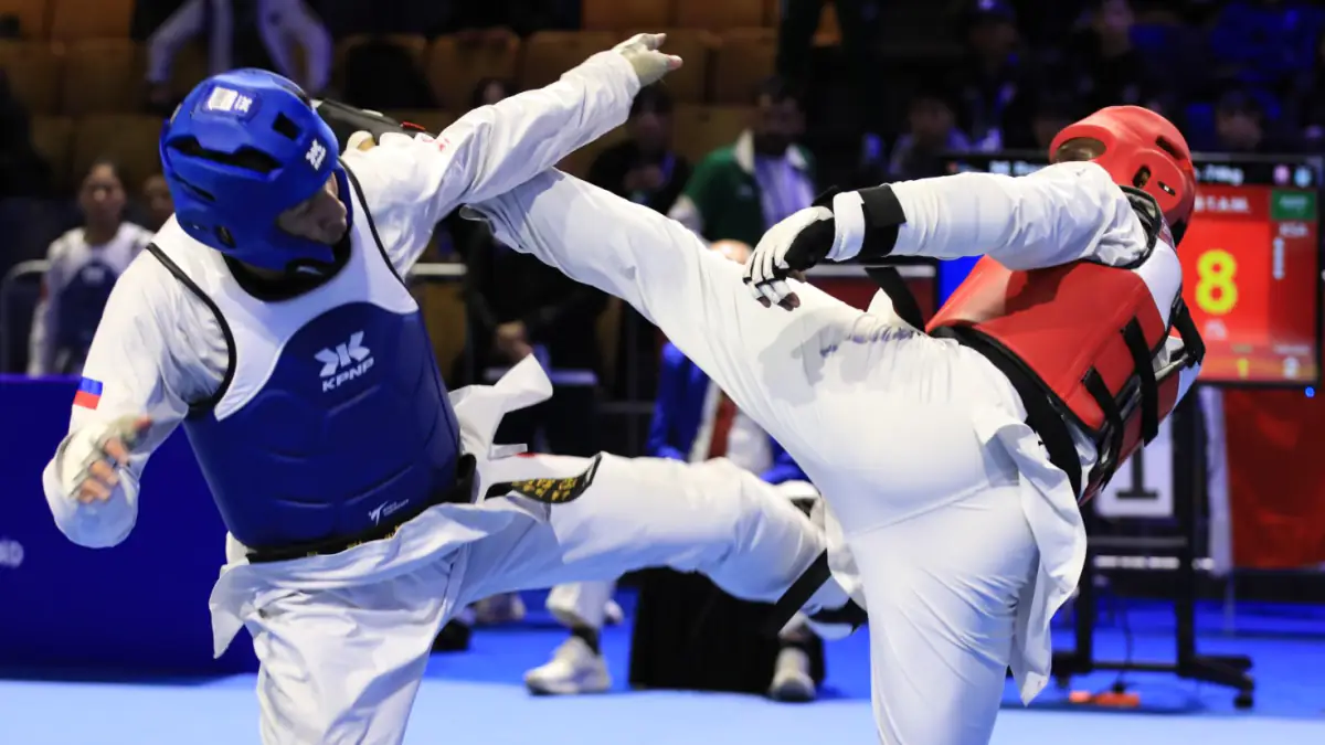 A head kick in a taekwondo fight